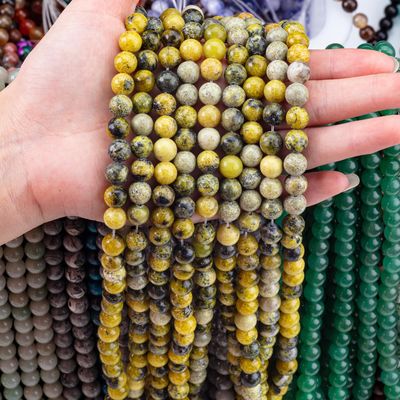سنگ قیمتی پولیش شده 6mm 8mm گره های زرد Howlite برای ساخت صنایع دستی