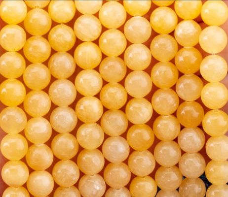کرم زرد ژاد کریستال طبیعی سنگ قیمتی رشته های گنجی گشاده سنگ نیمه گرانبها برای ساخت جواهرات DIY