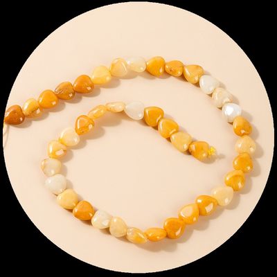 گلاب کوارتز گلاب سنگ گلابی گلاب سنگ طبیعی کریستال شکل قلب سنگ رشته های گره گشاده برای دستبند