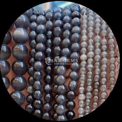 قرمز آبی بنفش رنگارنگ موهایی شکل گرد چشم گربه رشته های موهایی گشاده برای انرژی درمانی و هدیه دادن