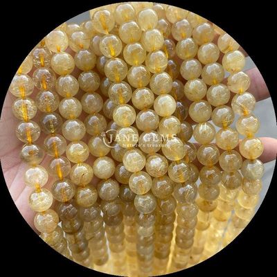 سنگ قیمتی پولیش گرد برش آتش کوارتز طلایی Rutilated کوارتز رشته های گنجی برای ساخت جواهرات DIY