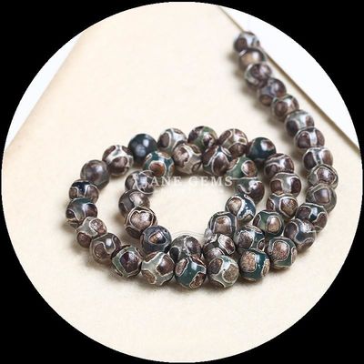 ساخت جواهرات DIY ضروری چند رنگ Tibatan Agate Beads سه چشم Dzi رشته های گره باز با تکنیک پولیش شده