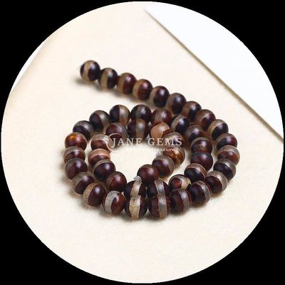 ساخت جواهرات DIY ضروری چند رنگ Tibatan Agate Beads سه چشم Dzi رشته های گره باز با تکنیک پولیش شده
