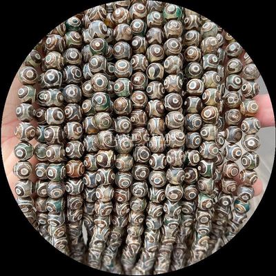 ساخت جواهرات DIY ضروری چند رنگ Tibatan Agate Beads سه چشم Dzi رشته های گره باز با تکنیک پولیش شده
