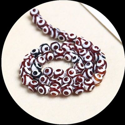 ساخت جواهرات DIY ضروری چند رنگ Tibatan Agate Beads سه چشم Dzi رشته های گره باز با تکنیک پولیش شده