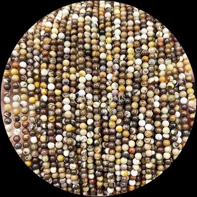 تکنیک سنگ قیمتی جلا داده شده شکل گرد کوارتز باغی رشته مهره های شل برای طرح های جواهرات نفیس